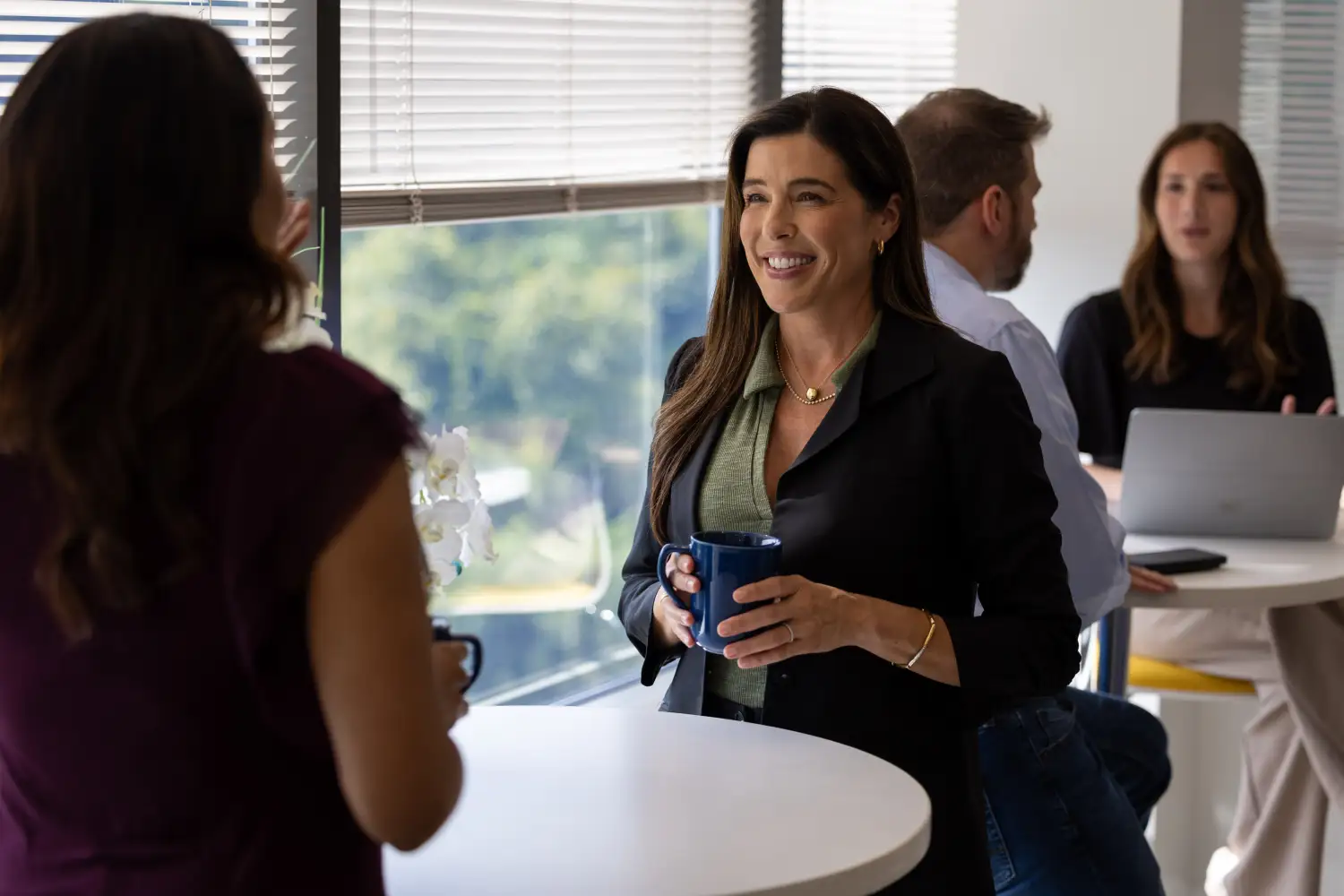 Operations leaders celebrate a successful PSA deployment that accelerated sales-to-delivery handoffs